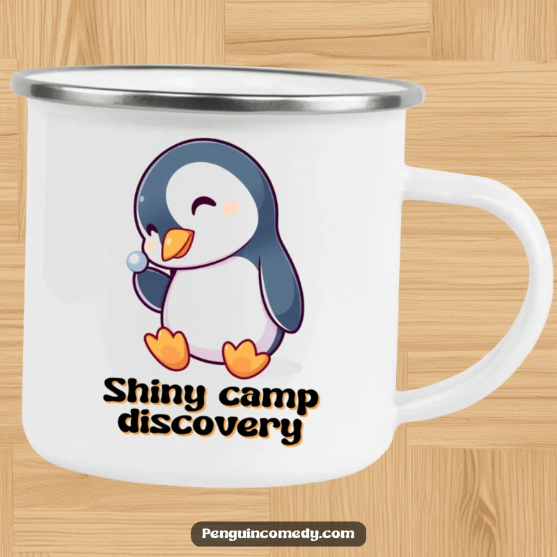 Funny penguin camping mug, a curious bird with a tilted head, admiring a shiny object, ready for outdoor fun.