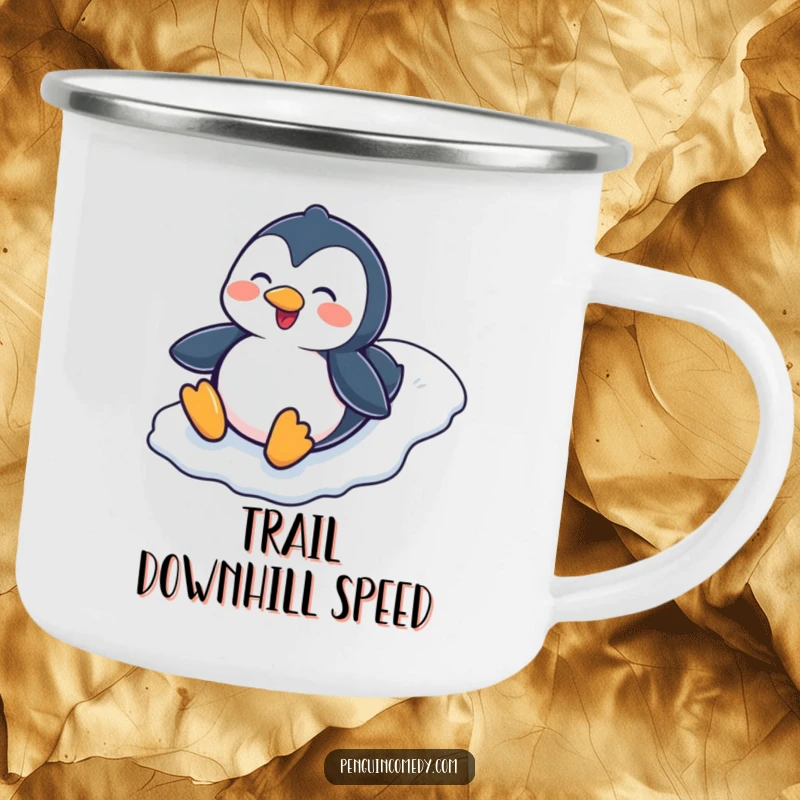 Funny Penguin Sliding Down Icy Hill Camping Mug, a sturdy enamel mug showcasing a joyful penguin character sliding down a snowy hill.