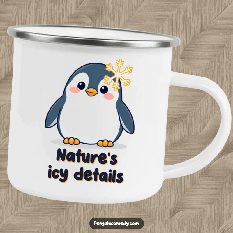 Funny camping mug featuring a curious penguin looking at a snowflake, ideal for enjoying beverages in the wild.