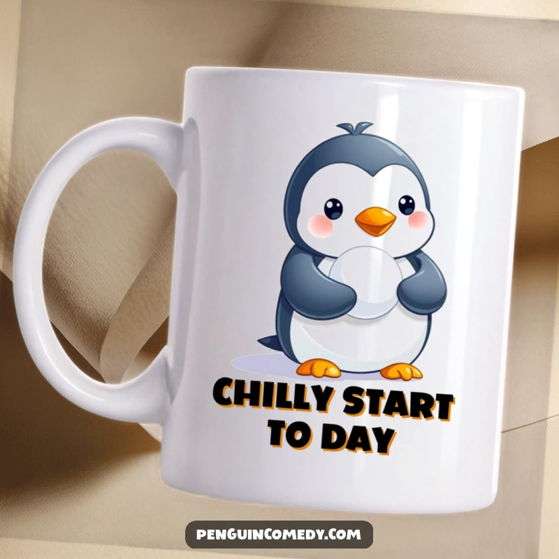 Funny mug featuring a cute penguin gleefully holding a tiny snowball, perfect for winter humor.