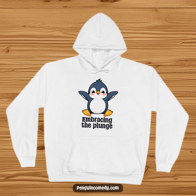 Funny hoodie featuring a happy penguin with flippers spread wide, ready to dive with infectious enthusiasm.