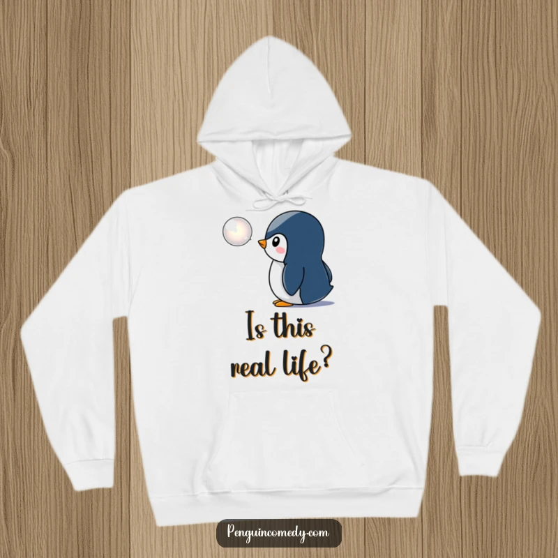 Funny penguin hoodie, focused on a shimmering bubble icon with deep interest, radiating cozy and humorous vibes, perfect winter wear.