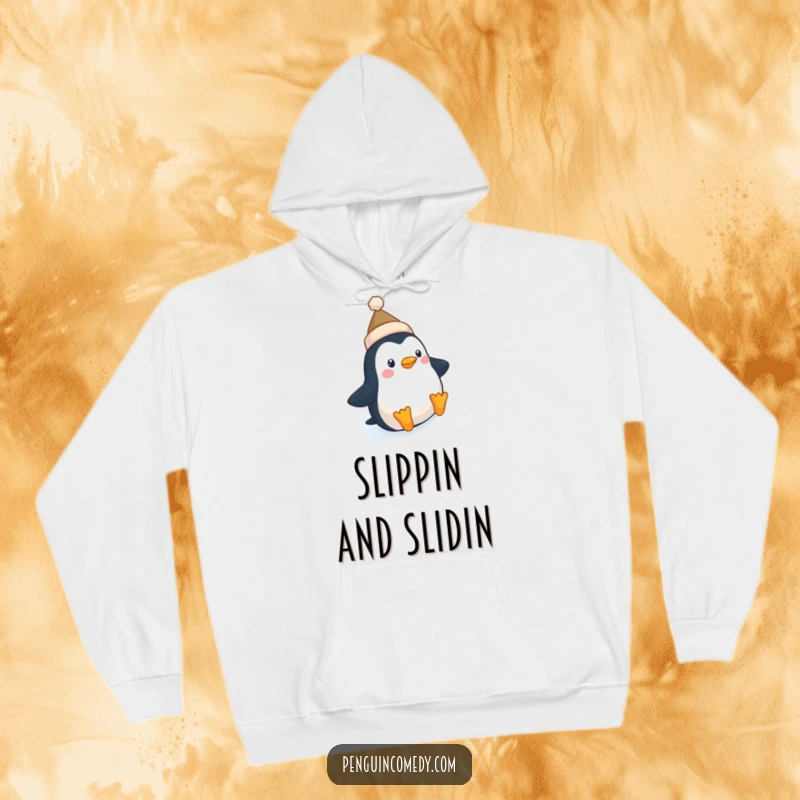 Funny Penguin Hat Hoodie: Cozy sweatshirt featuring a cute penguin in a tiny hat sliding down an icy slope, full of winter cheer.