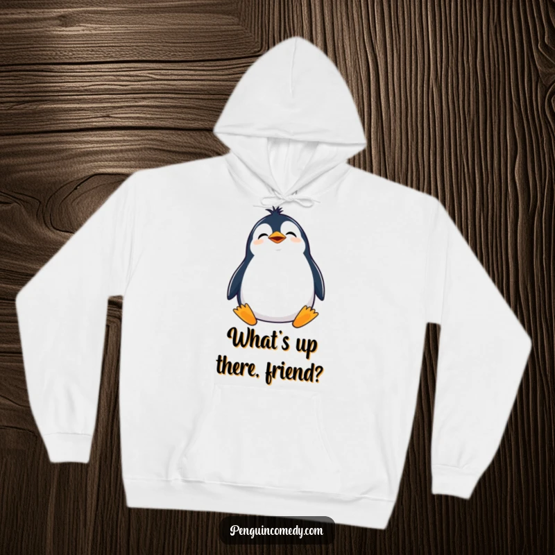 Funny hoodie featuring a giggling penguin with its head tilted, gazing curiously upwards with infectious amusement.