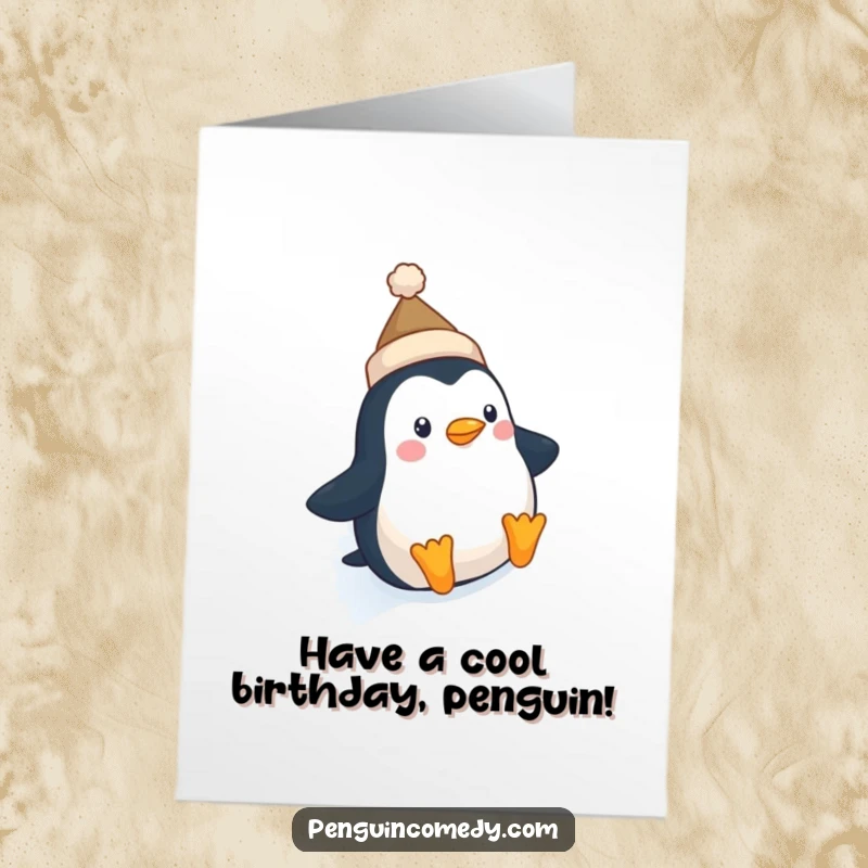 Funny Free Printable Birthday Card: A cute penguin in a tiny hat joyfully slides down a snowy slope.