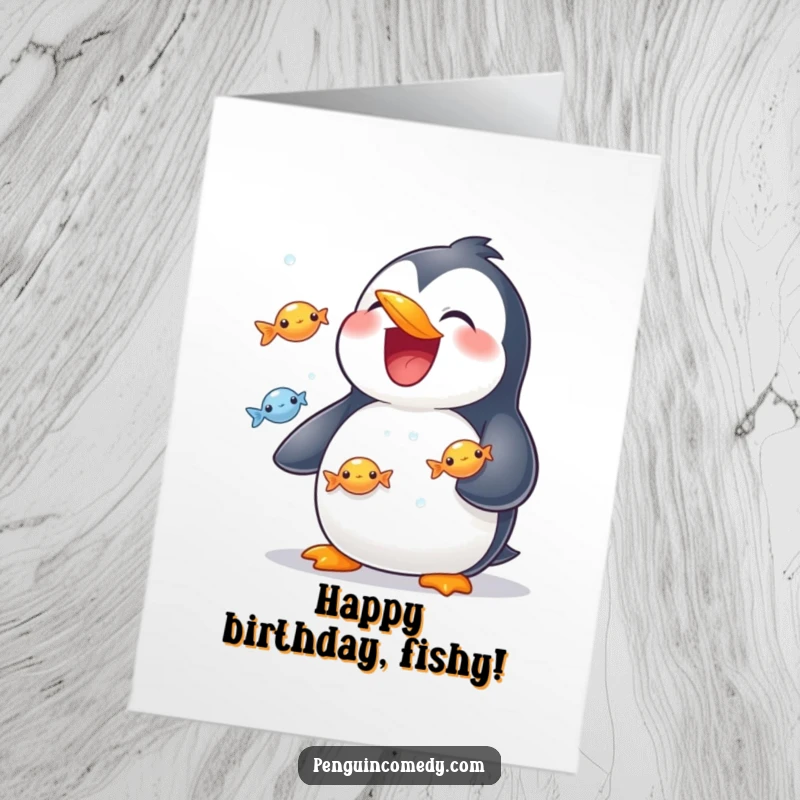 Funny Free Printable Birthday Card: Grinning penguin juggles shiny fish, celebrating a birthday with a humorous downloadable gift.