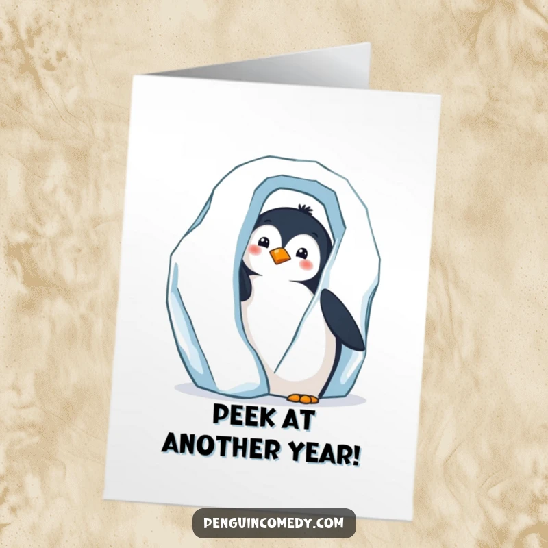 Funny Free Printable Birthday Card: Curious penguin peeks from iceberg, offering a birthday surprise with a downloadable gift.