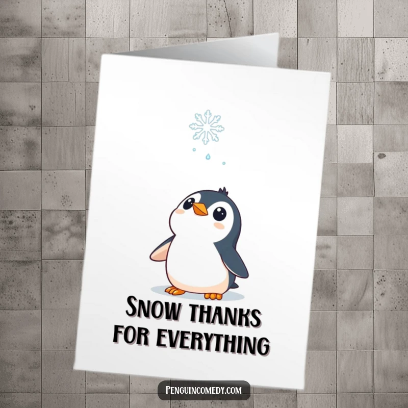Funny Free Printable Thank You Card: A curious penguin looks up with fascination at a delicate falling snowflake.