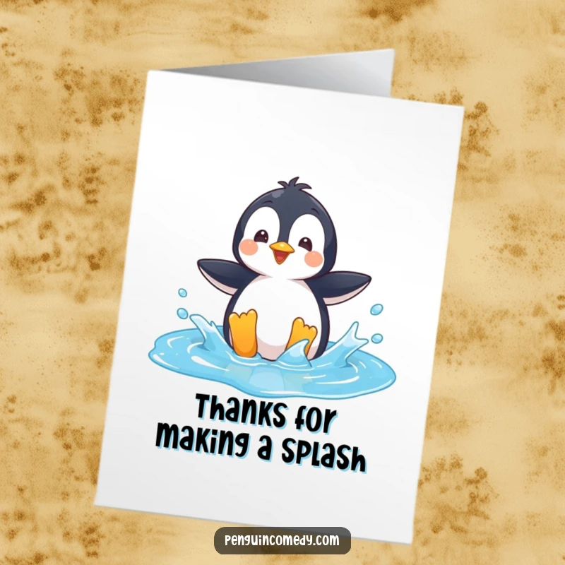 Funny Free Printable Thank You Card: A playful penguin makes a big splash in a bright blue puddle, showing thanks.