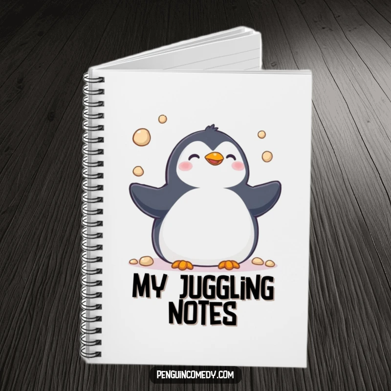 Funny notebook with a cheerful penguin juggling pebbles, ideal for note-taking and brainstorming with a touch of whimsical humor.