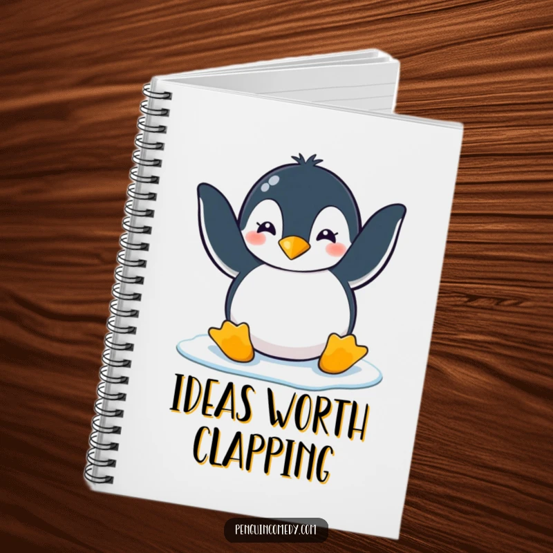 Funny penguin clapping playfully with flippers on ice, designed for a fun and funny notebook, perfect for gifting.