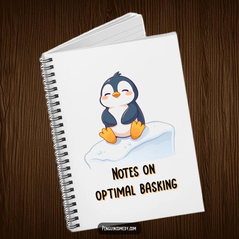 Funny penguin notebook with a content penguin sunbathing on a snowy ledge, ideal for jotting down notes with hilarious winter-themed flair.