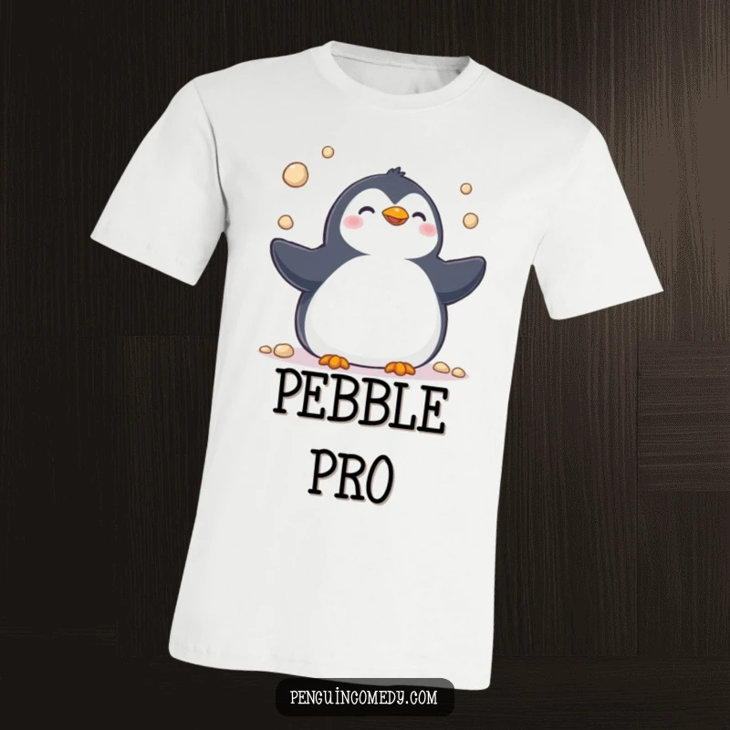 Funny t-shirt with a happy penguin chirping joyfully while juggling pebbles, showcasing skill and lighthearted fun.