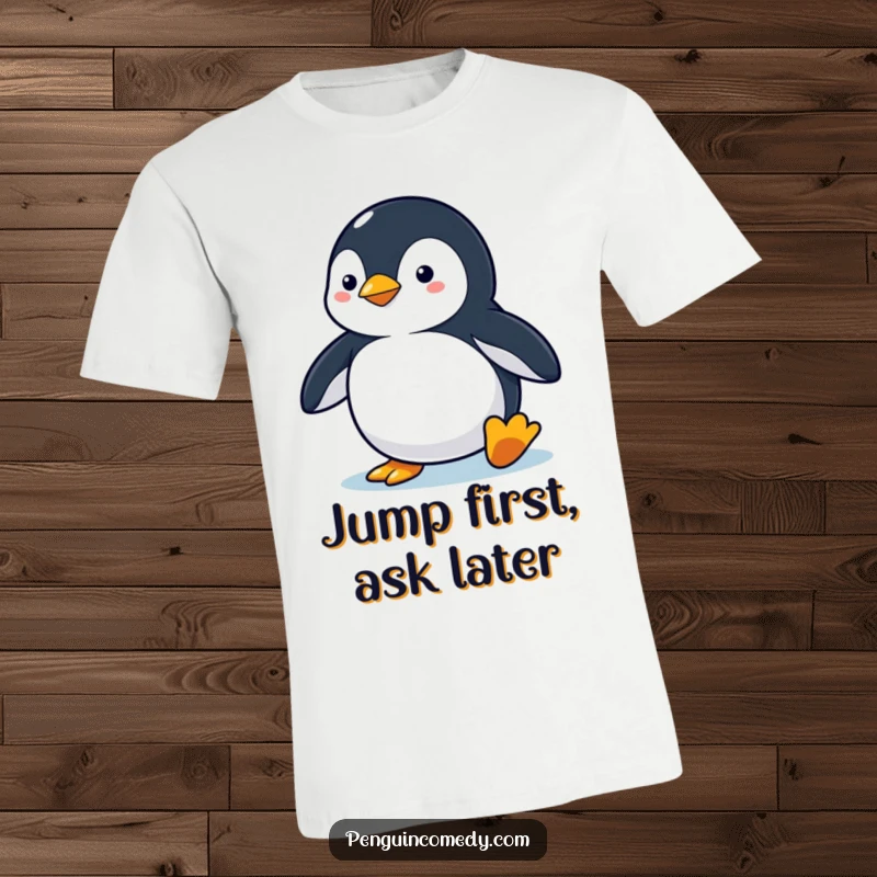 Funny penguin t-shirt depicting a penguin in a focused, alert stance, ready to dive impulsively into water.
