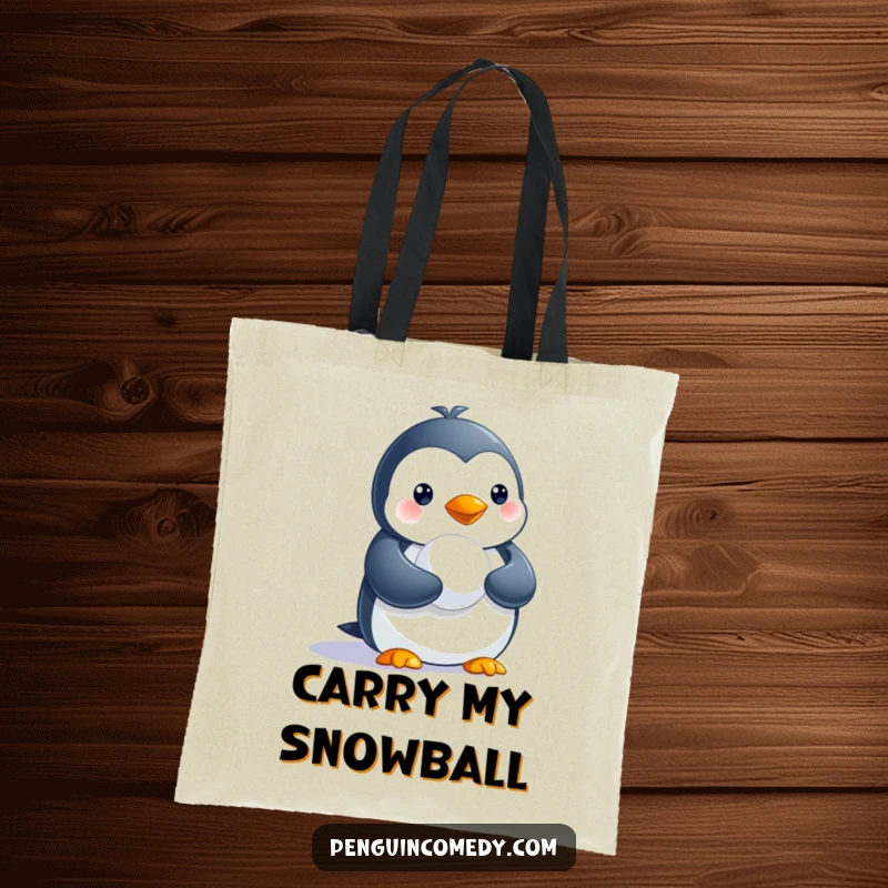 Funny tote bag featuring a cute penguin holding a tiny snowball, ideal for daily use and humor.
