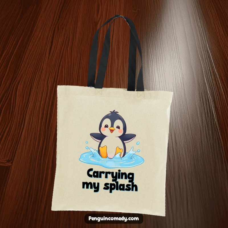 Funny Tote Bag: A playful penguin character splashing energetically in a bright blue puddle, ready for fun.