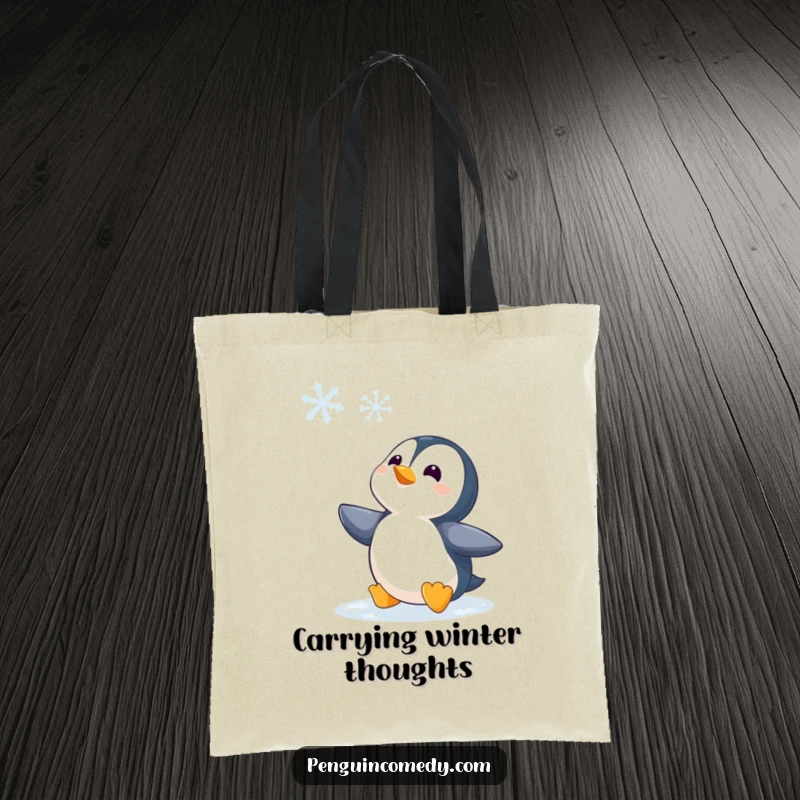 Funny Penguin Watching Snowflake Tote Bag, a tote with a charming penguin character observing a snowflake descend, perfect for winter enthusiasts.