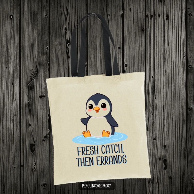 Funny penguin tote bag showing an excited penguin squawking as it surfaces from the ocean, ideal for carrying items with lively flair.
