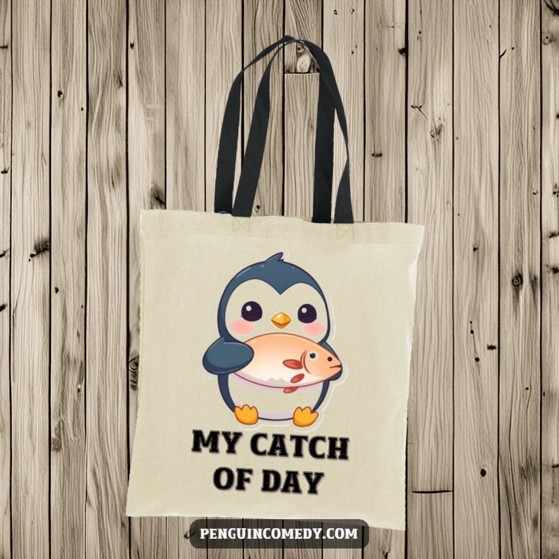 Funny tote bag with a surprised penguin holding a fish, a durable and humorous accessory for daily use.