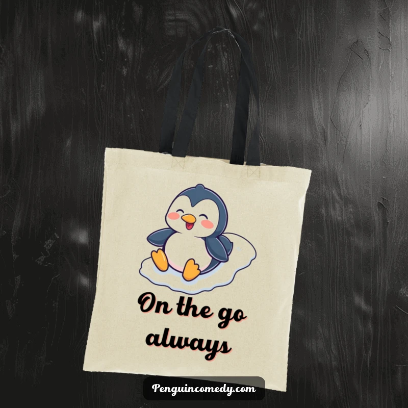 Funny Penguin Sliding Down Icy Hill Tote Bag, a durable tote featuring a cheerful penguin character sliding smoothly down a snowy incline.