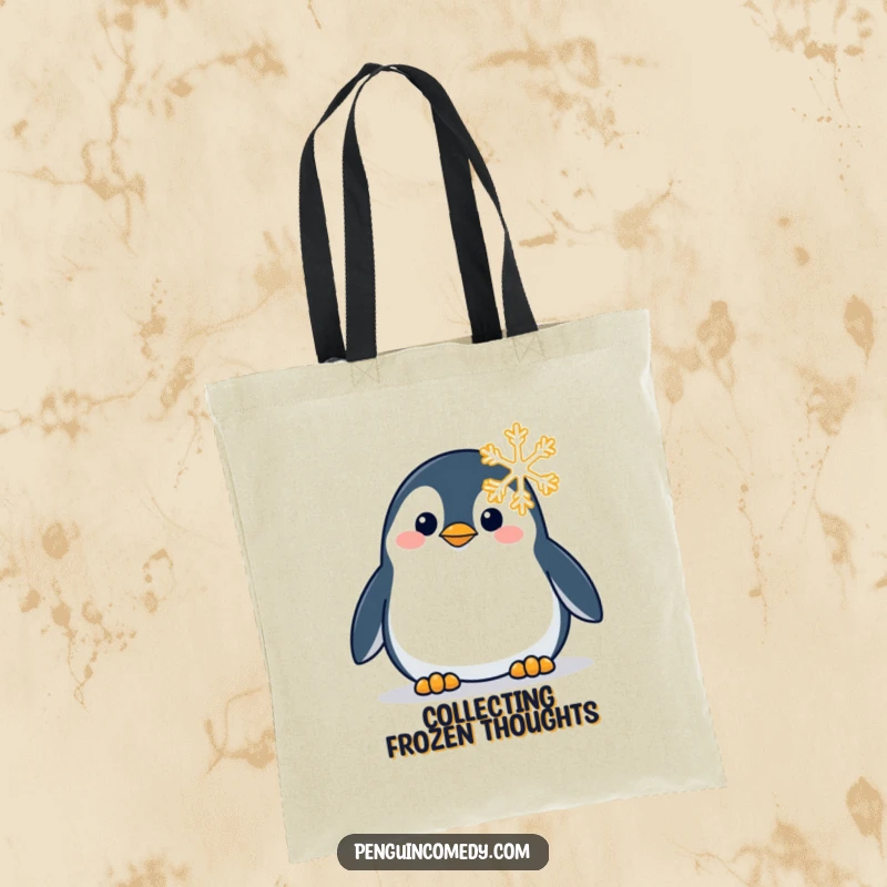 Funny tote bag illustrating a penguin looking with deep curiosity and fascination at a single, intricate snowflake.
