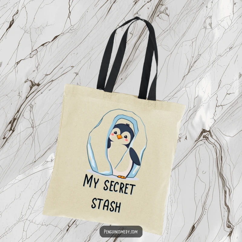 Funny tote bag with a curious penguin peeking out from behind a giant iceberg, adding a playful element.